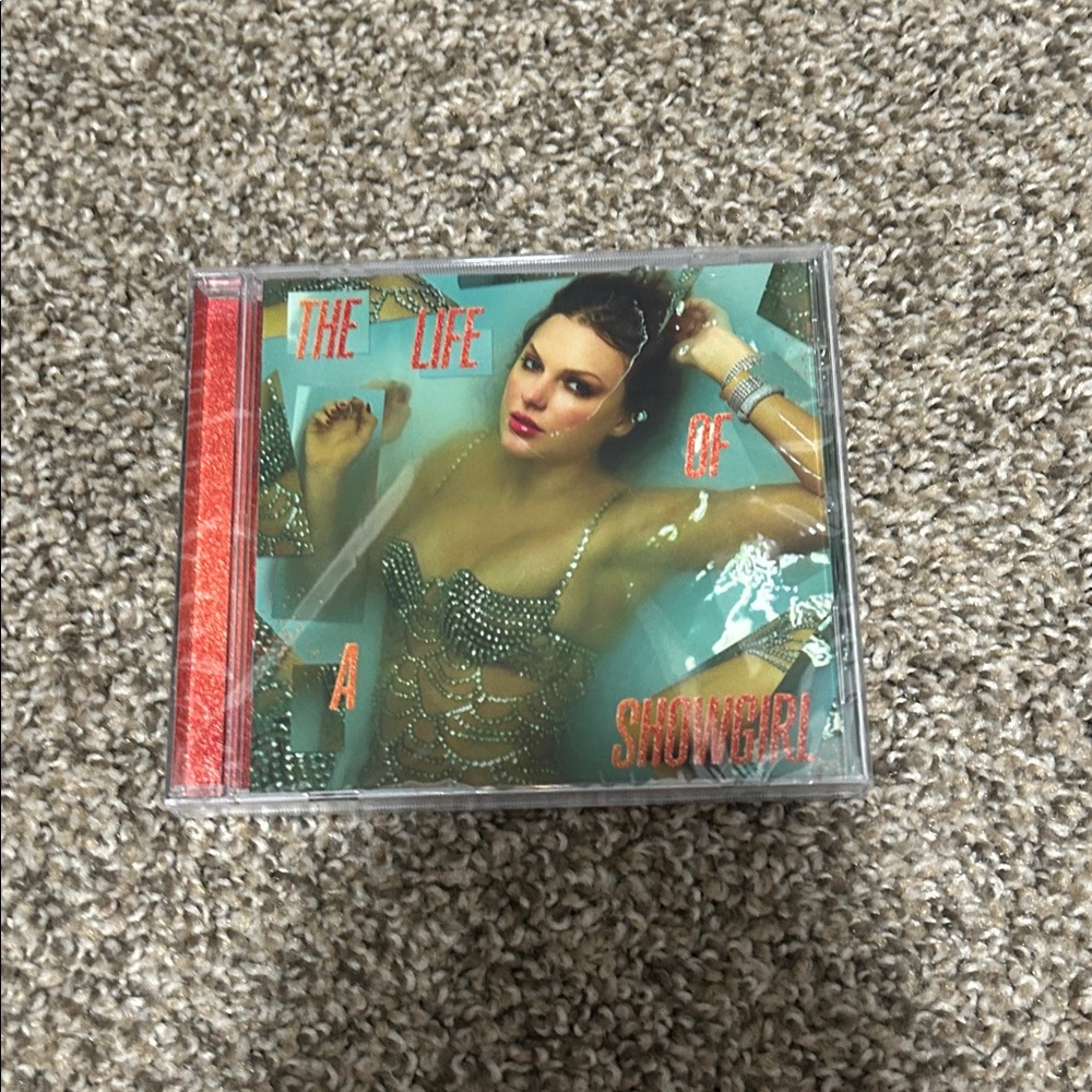The Life of a Showgirl CD - Teal Cover with Coral Text